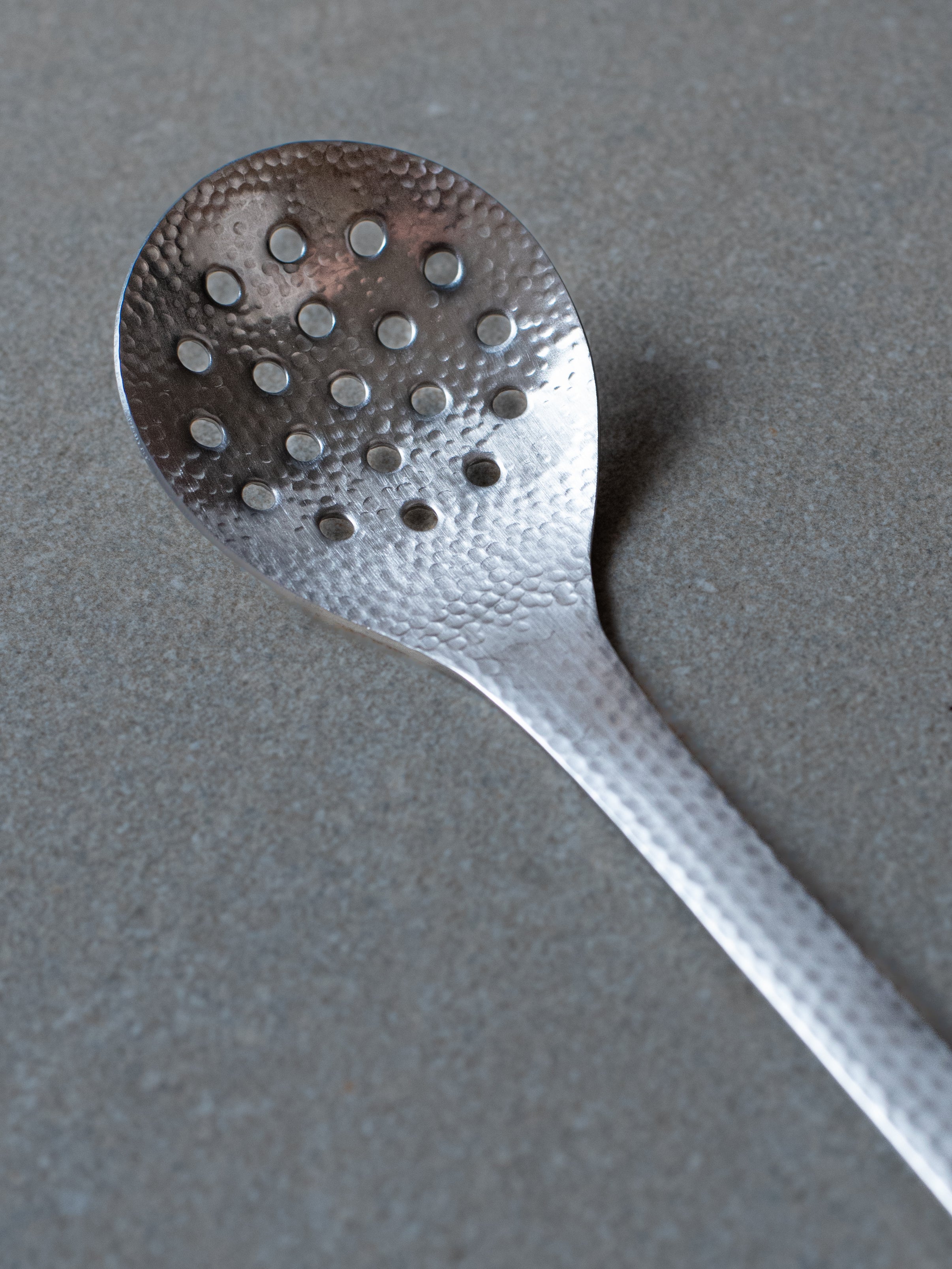 Nagomi Hammered Cutlery - Round Slotted Serving Spoon II