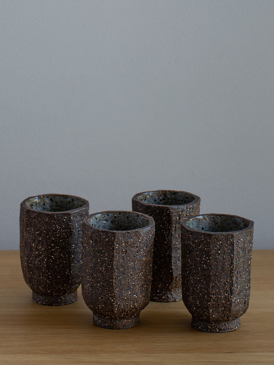 https://www.mujostore.com/cdn/shop/files/mujo-store-carved-stoneware-tea-cups-set-4-4.jpg?v=1693213216&width=533